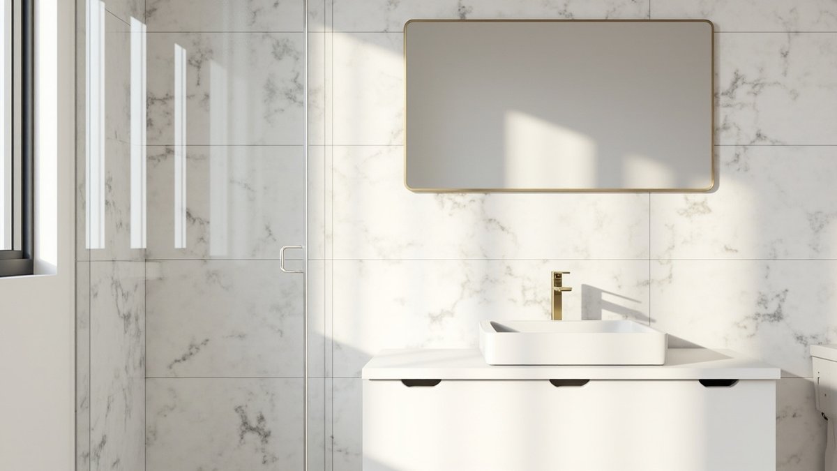 Illustrative concept design: white marble-look bathroom with a gold-framed mirror, gold-tone tap and frameless glass shower door