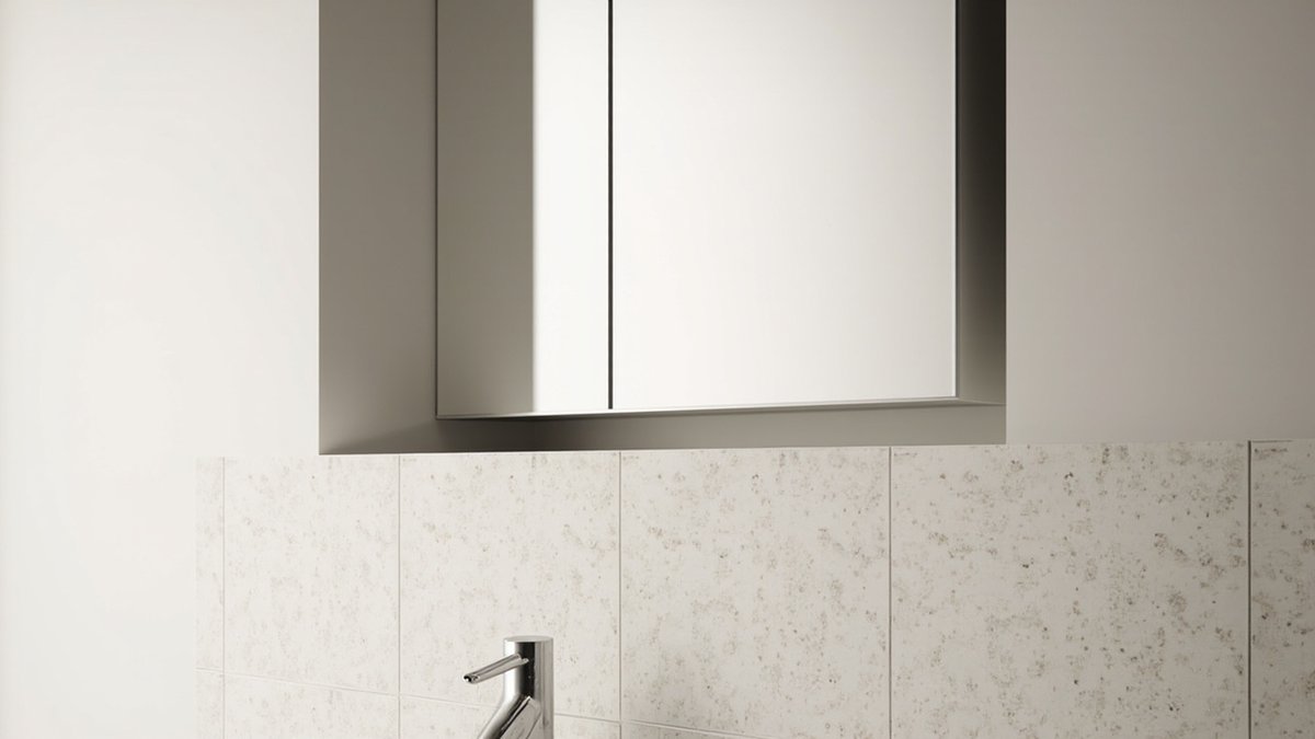 Illustrative concept design: two-door mirror cabinet recessed into a wall opening above a terrazzo-look tiled splashback