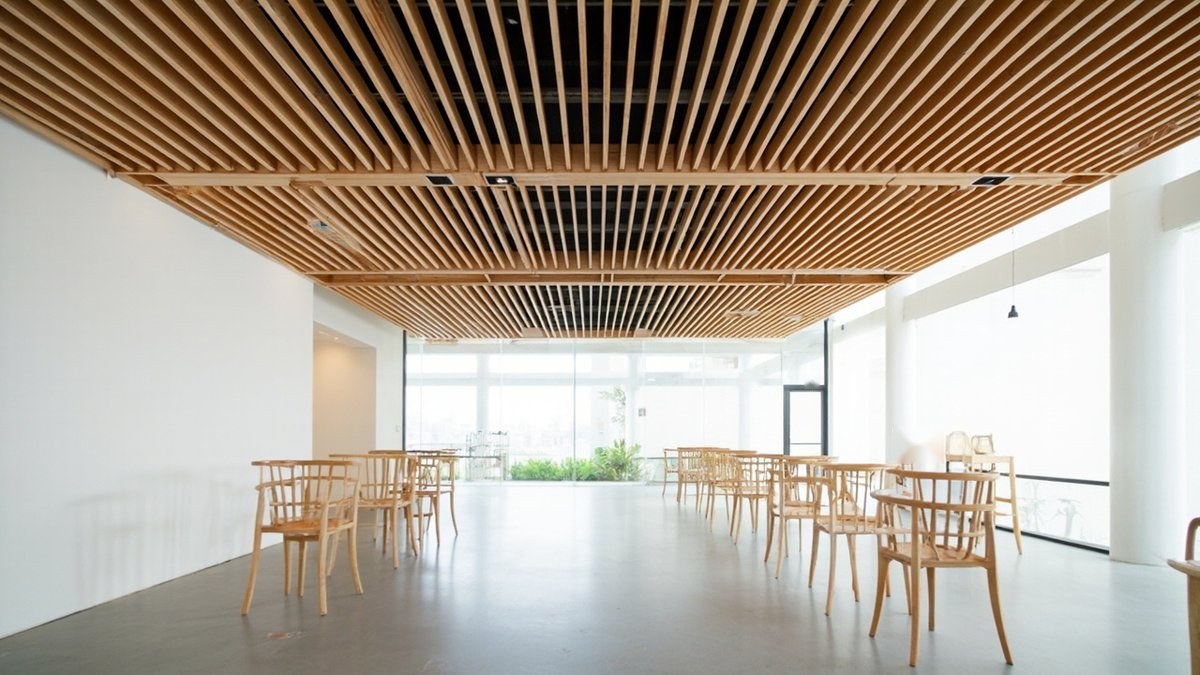 Illustrative concept design: bright cafe under an evenly spaced honey timber slat ceiling with spindle-back chairs