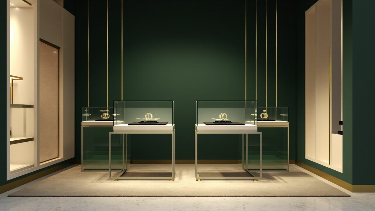 Illustrative concept design: jewellery boutique with glass showcases, deep green walls, brass strips and lit niches
