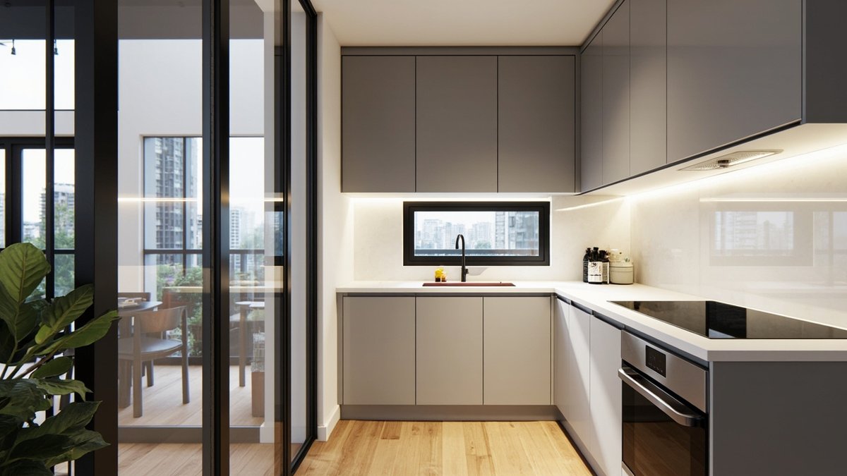 Ilustrasi konsep reka bentuk: dapur L kondo padat dengan kabinet kelabu tanpa pemegang dan permukaan quartz di sebelah partition kaca gelangsar berbingkai hitam