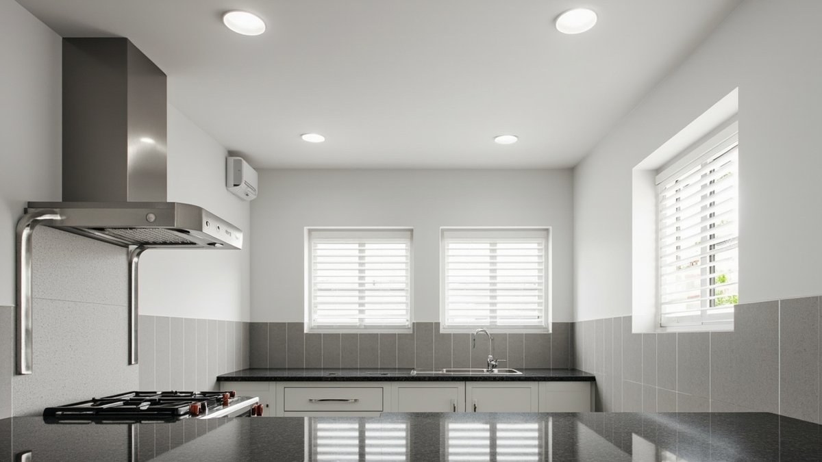 Illustrative concept design: flat white calcium silicate ceiling with downlights over a grey-tiled terrace wet kitchen with a stainless chimney hood