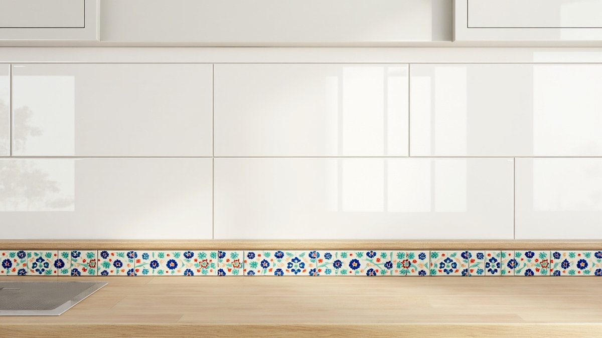 Illustrative concept design: glossy white tiles with one border row of floral Peranakan-style tiles above an oak-look worktop