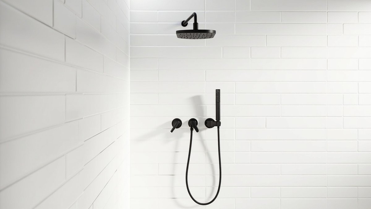 Illustrative concept design: white rectangular tiled shower wall with matt black rain shower head, two lever valves and slim hand shower on a hose