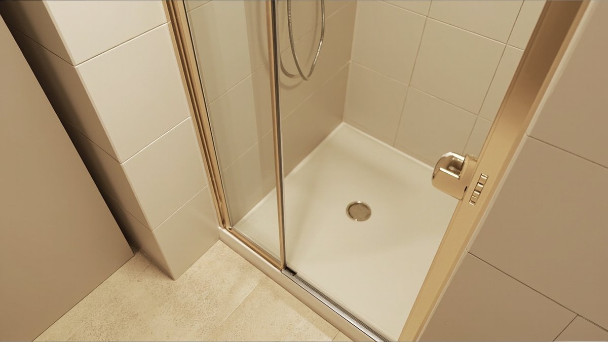 Illustrative concept design: champagne aluminium framed hinged glass shower door closing a tiled shower recess