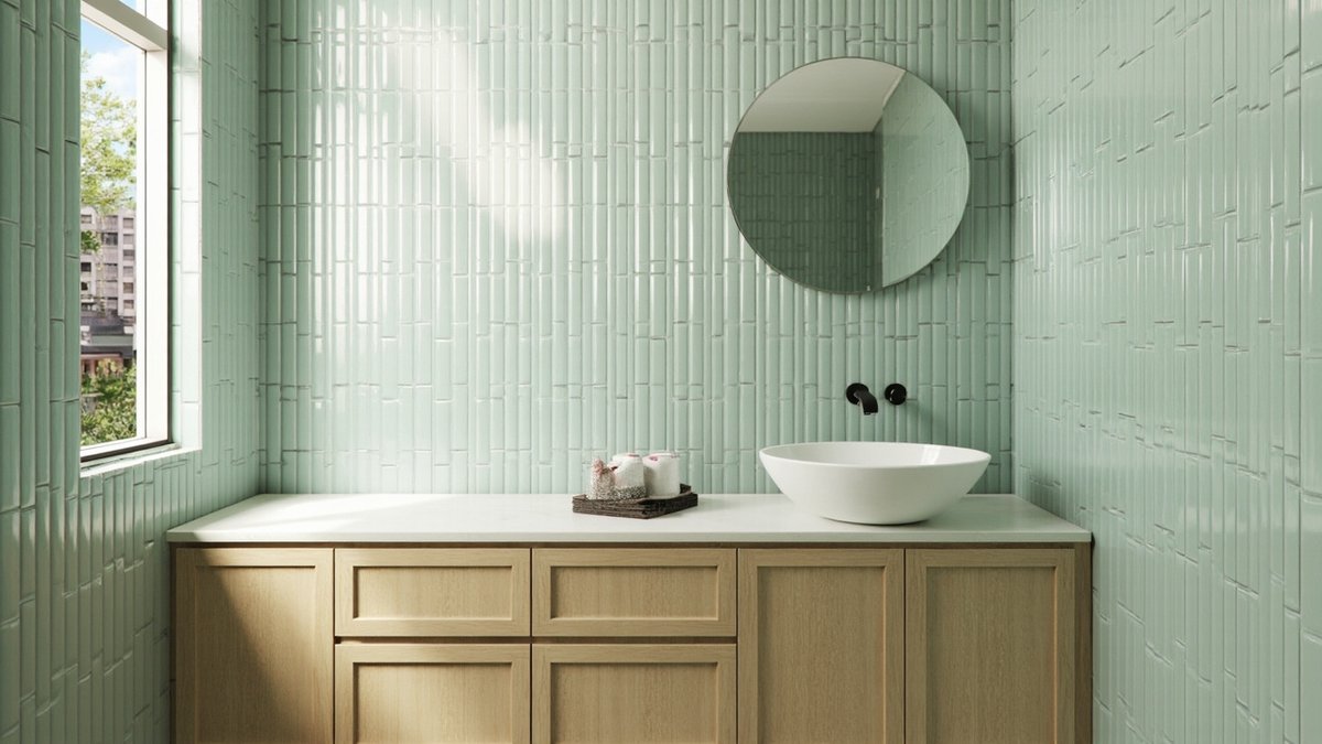 Illustrative concept design: bathroom feature wall of glossy sage green tiles stacked in vertical columns