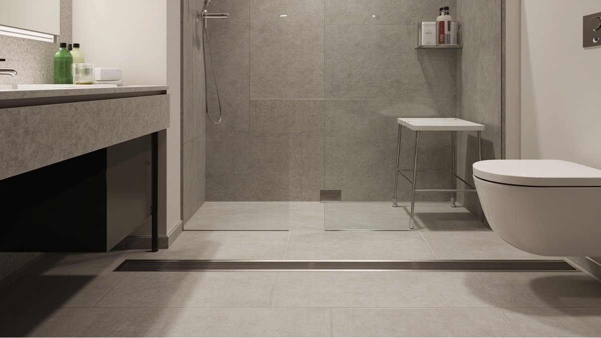 Level step-free shower with a linear drain, fixed glass panel and fold-down seat