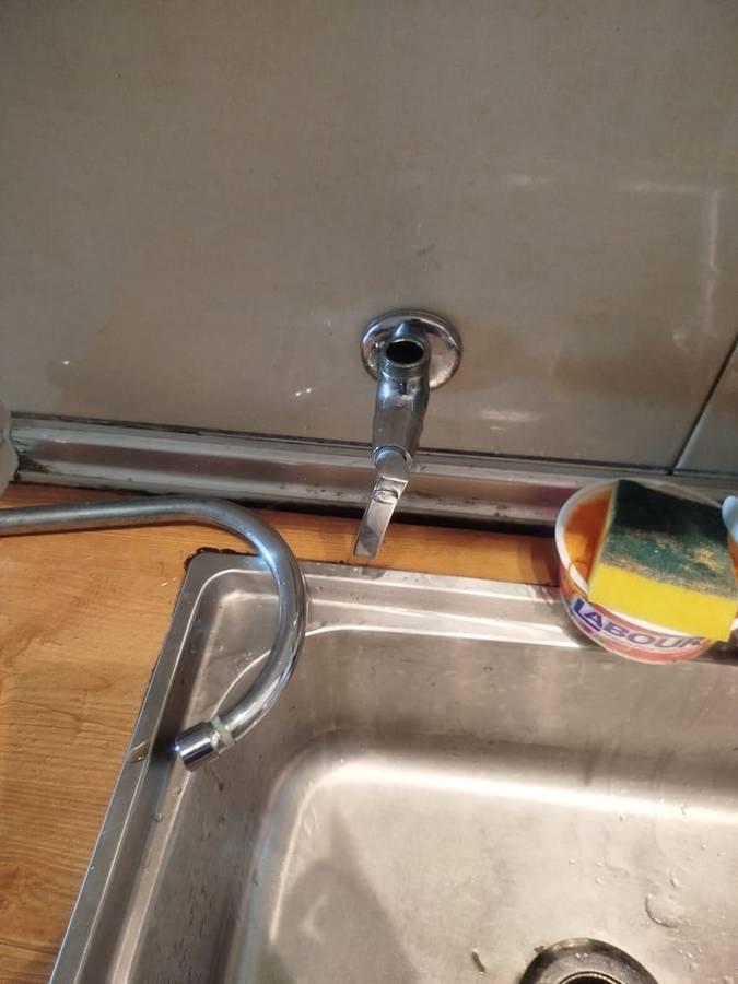Before: Kitchen faucet replacement