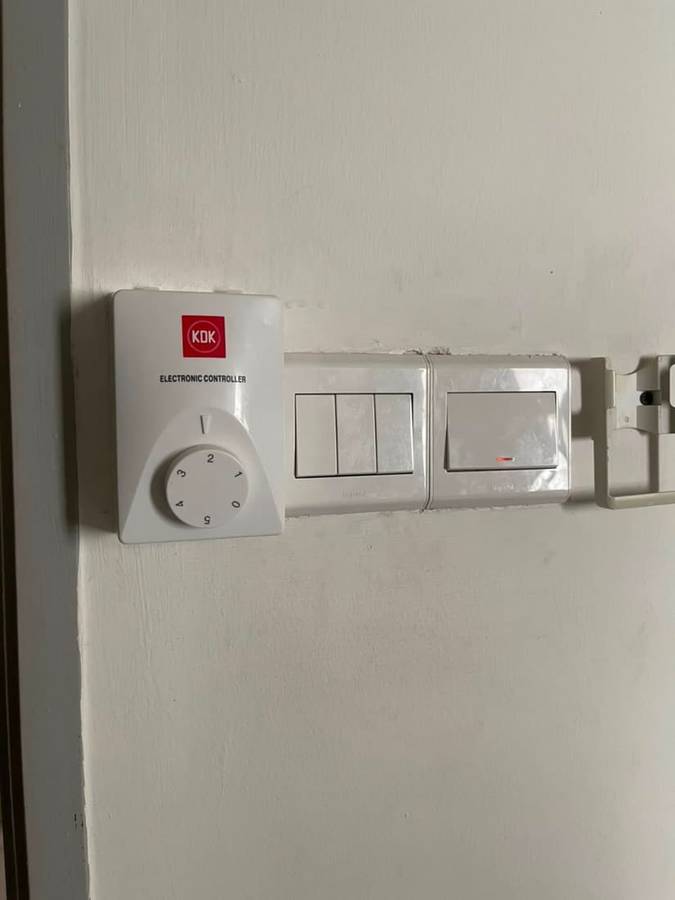 After: Exposed live wiring made safe
