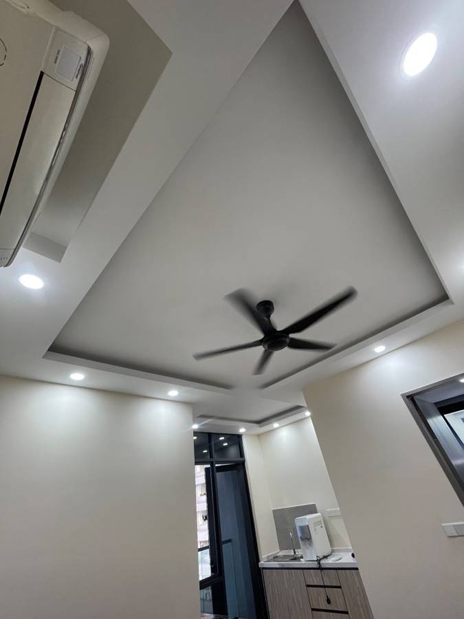 After: Ceiling fan where bare wiring hung