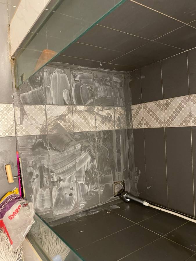 During: Shower leak traced & waterproofed
