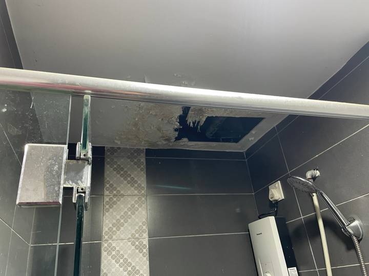 Before: Bathroom ceiling after a leak