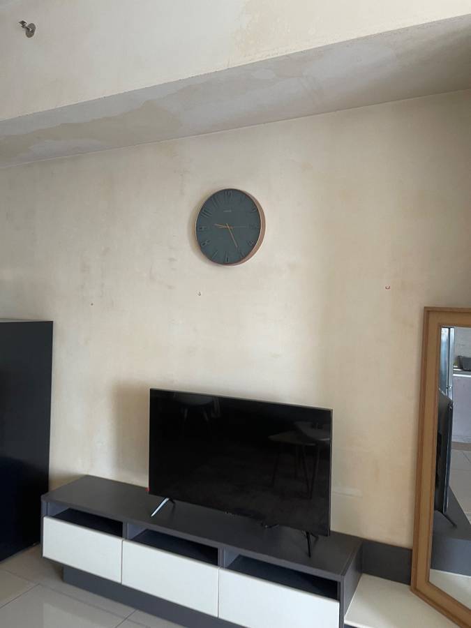 Before: Stained living room made new